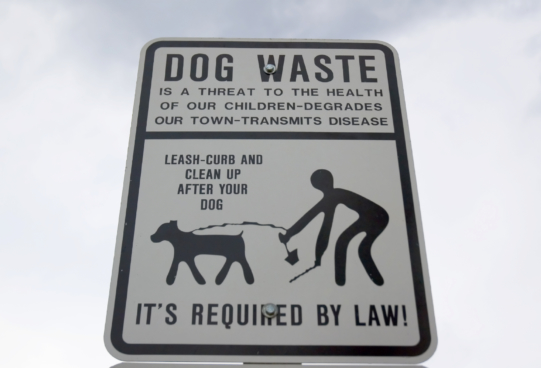 pet waste pick up sign