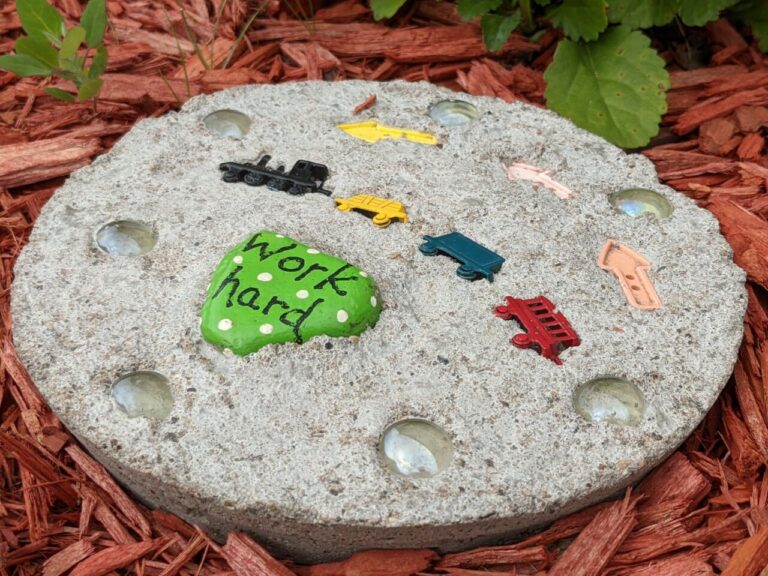 toys embedded into rock