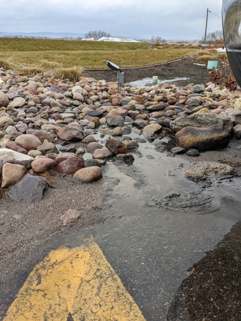 rocks used for parking lot water drainage